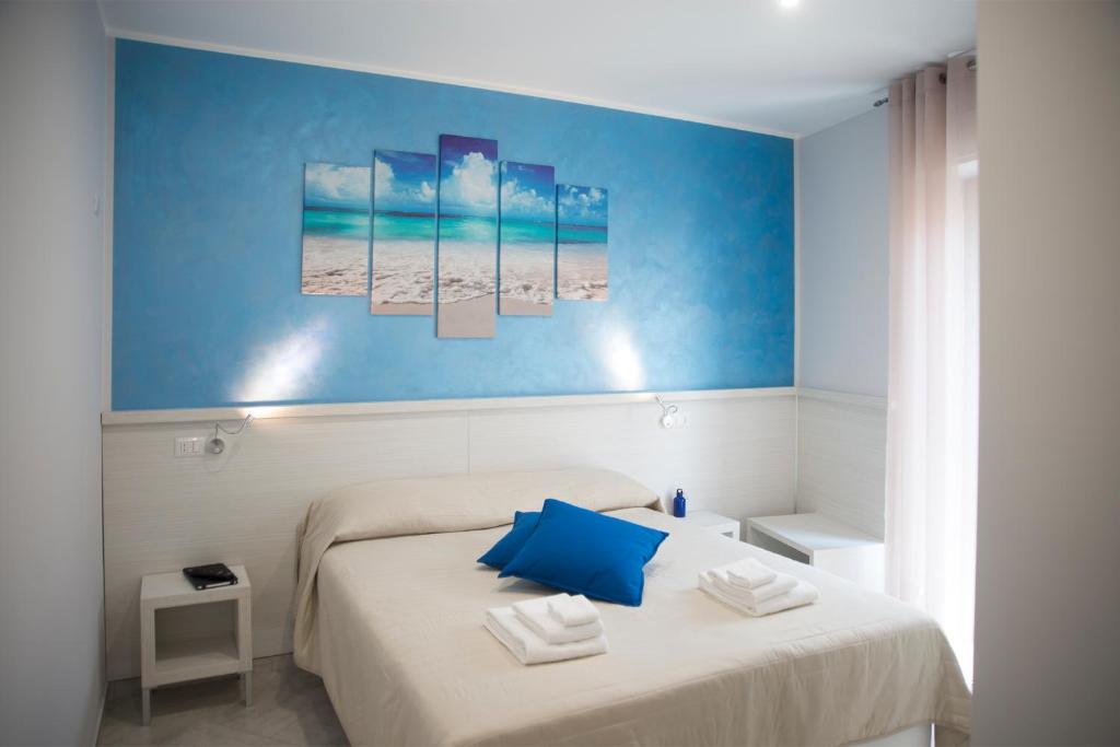 Posteľ alebo postele v izbe v ubytovaní B&B La Pigna