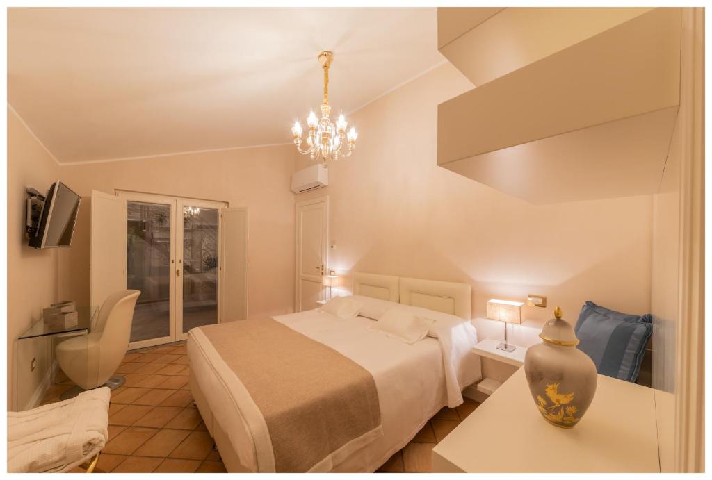 Łóżko lub łóżka w pokoju w obiekcie Boutique - Lodge & Suites