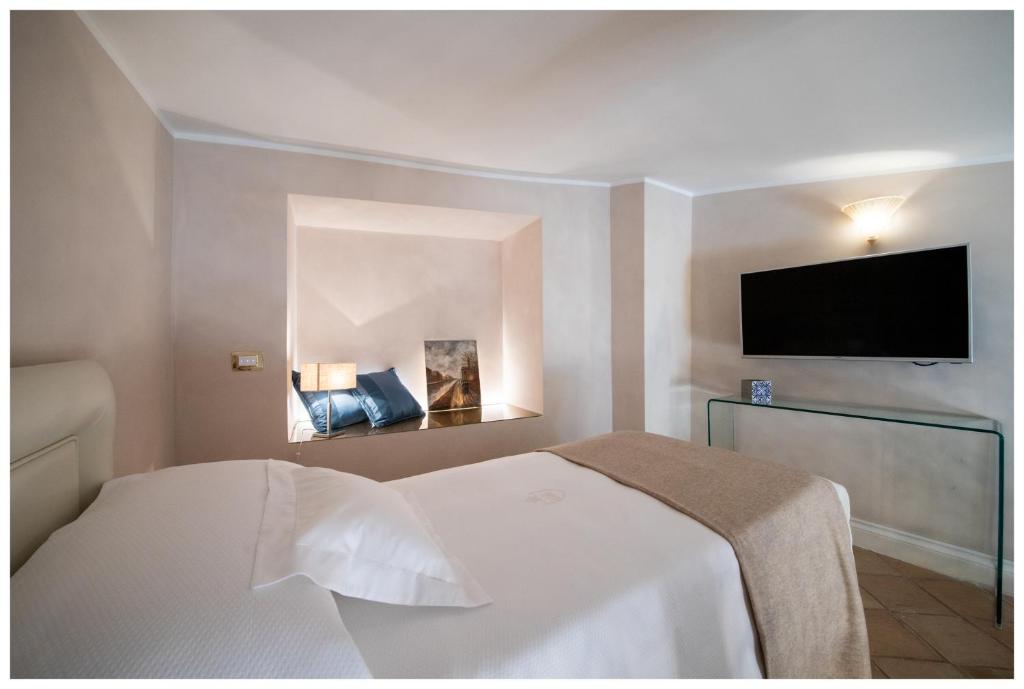 Łóżko lub łóżka w pokoju w obiekcie Boutique - Lodge & Suites