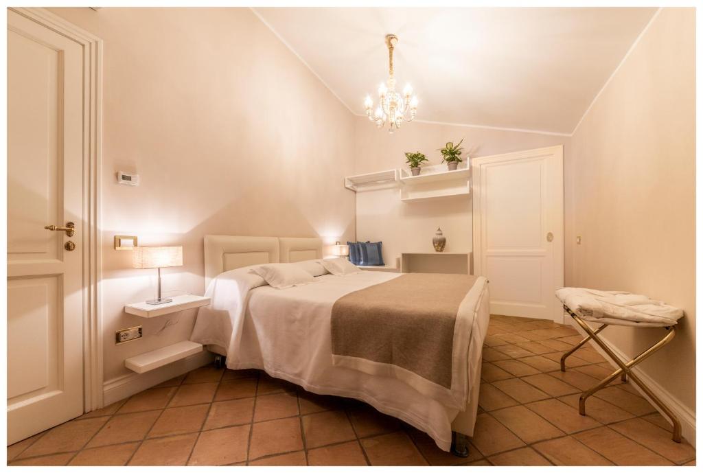 Łóżko lub łóżka w pokoju w obiekcie Boutique - Lodge & Suites