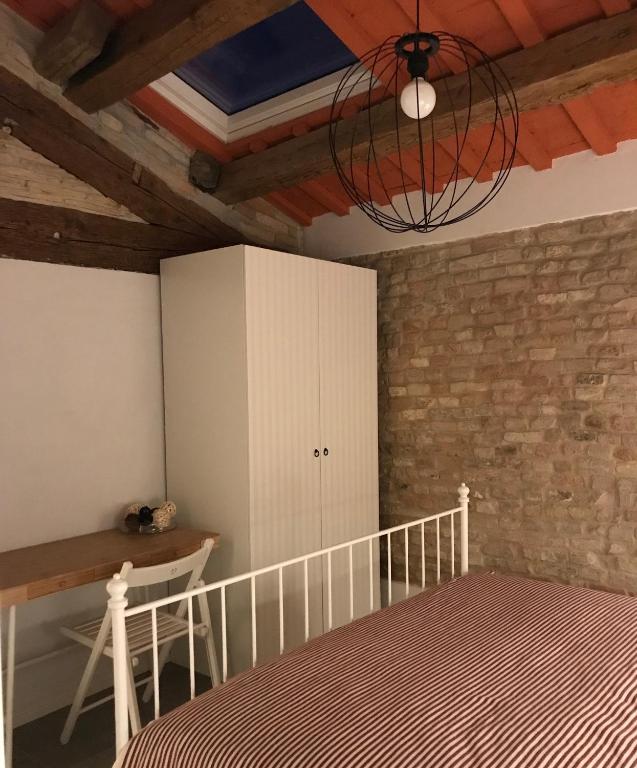 Postel nebo postele na pokoji v ubytování La Trave