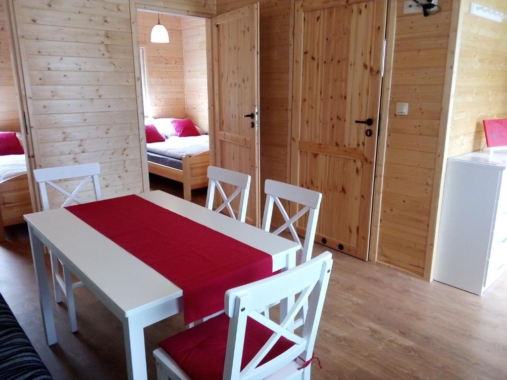 Postel nebo postele na pokoji v ubytování MożeMorze? Ośrodek Domków Letniskowych
