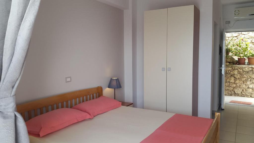 Postel nebo postele na pokoji v ubytování Sunset Boulevard Hotel