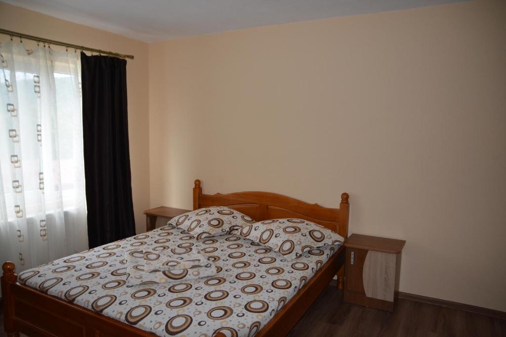 Letto o letti in una camera di Bogdan si Raluca