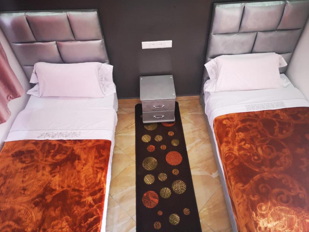 Postel nebo postele na pokoji v ubytování Equinox