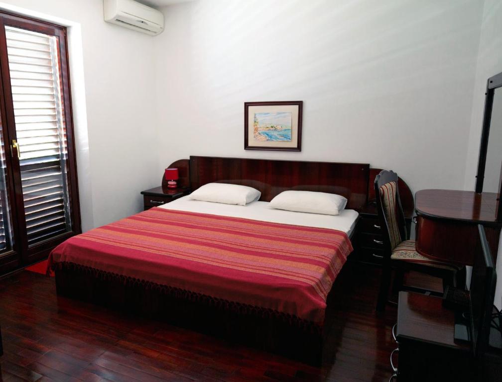 Postel nebo postele na pokoji v ubytování Villa Sara Guesthouse