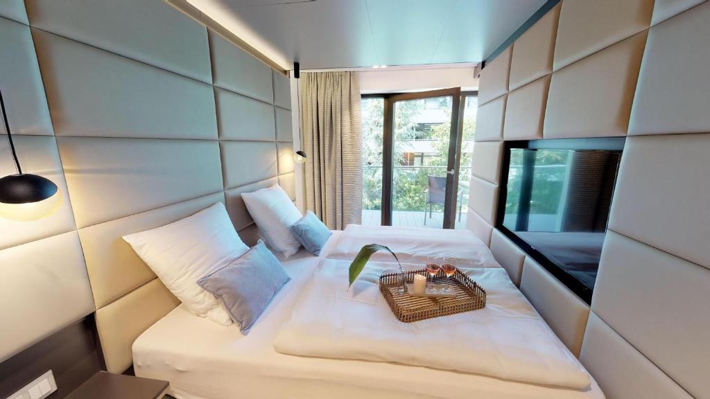 Postel nebo postele na pokoji v ubytování White Pearl Apartment 1.15