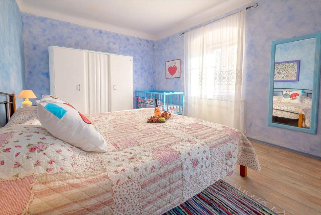 Postel nebo postele na pokoji v ubytování House Helena
