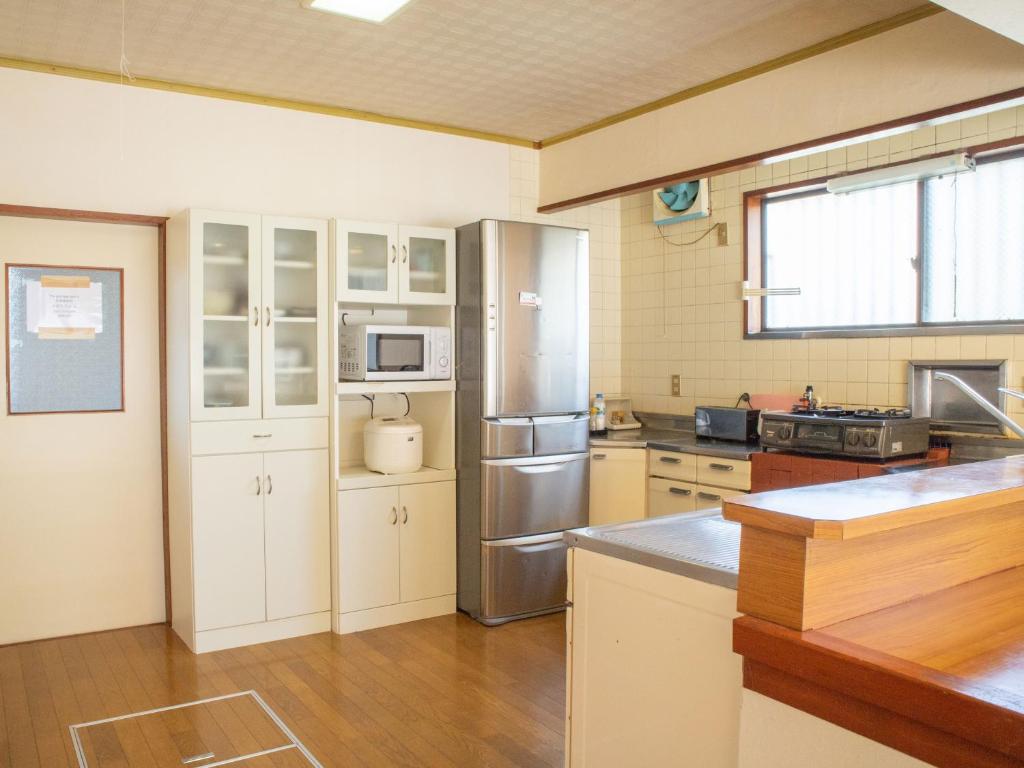 Kuchyň nebo kuchyňský kout v ubytování Guesthouse ENN