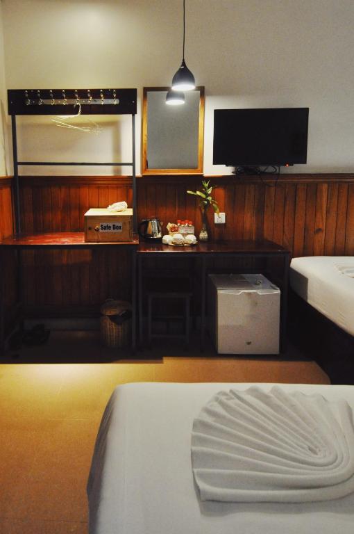 Kuchyň nebo kuchyňský kout v ubytování Bokre Angkor Hostel