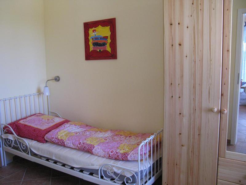 Postel nebo postele na pokoji v ubytování Kuddels Fischerhus 2