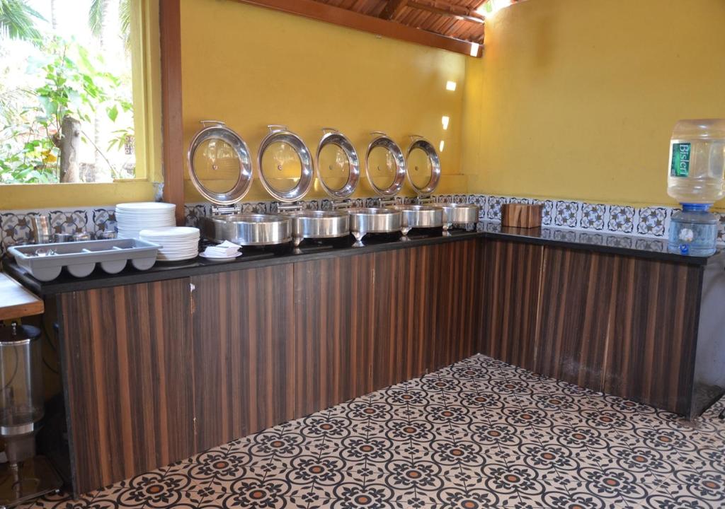 Kuchyň nebo kuchyňský kout v ubytování Tangerine Boutique Resort