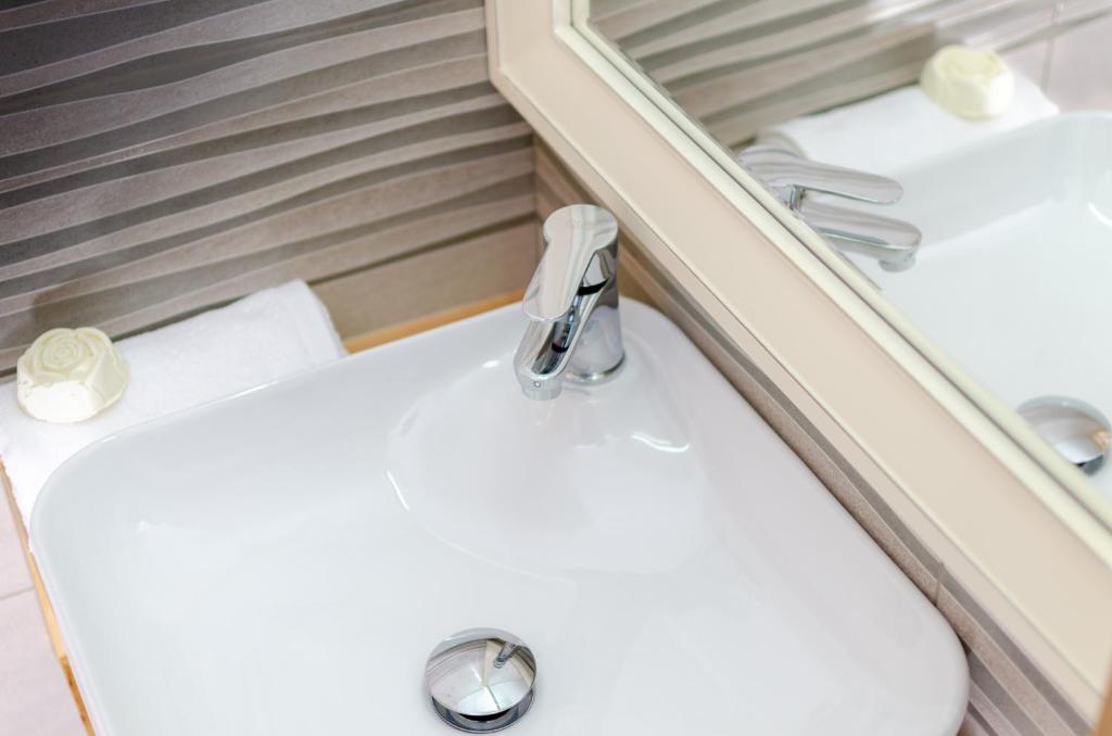 A bathroom at Happiness Apartments