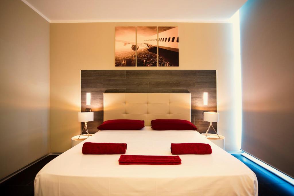 Postel nebo postele na pokoji v ubytování Star Hotel Airport Verona