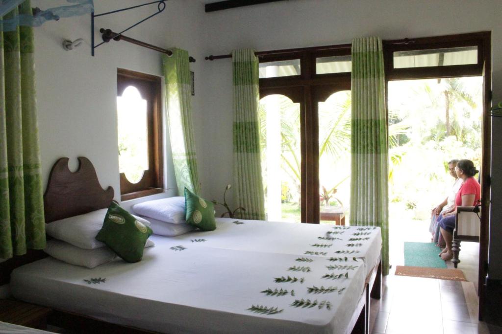 Postel nebo postele na pokoji v ubytování Hideaway Homestay Habarana