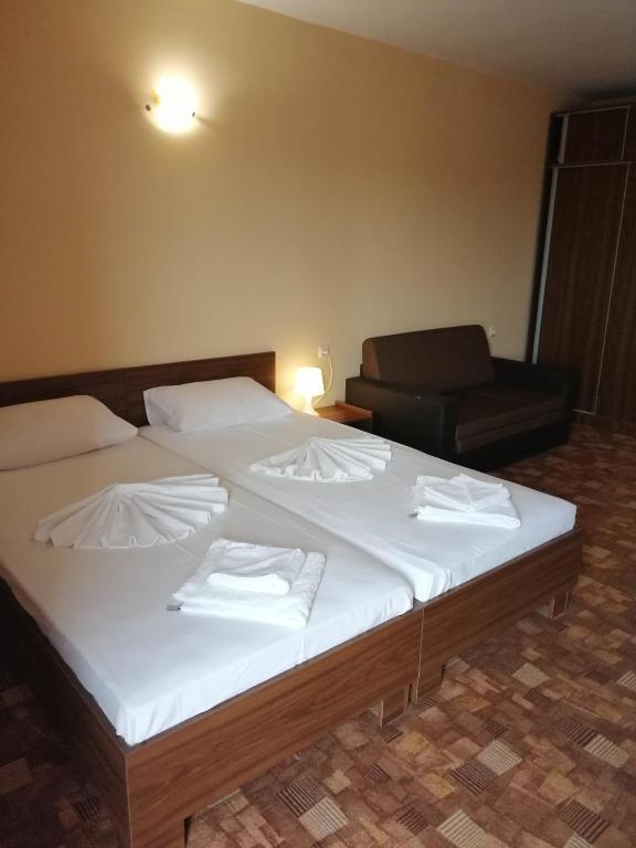 Postel nebo postele na pokoji v ubytování Hotel Sapphire