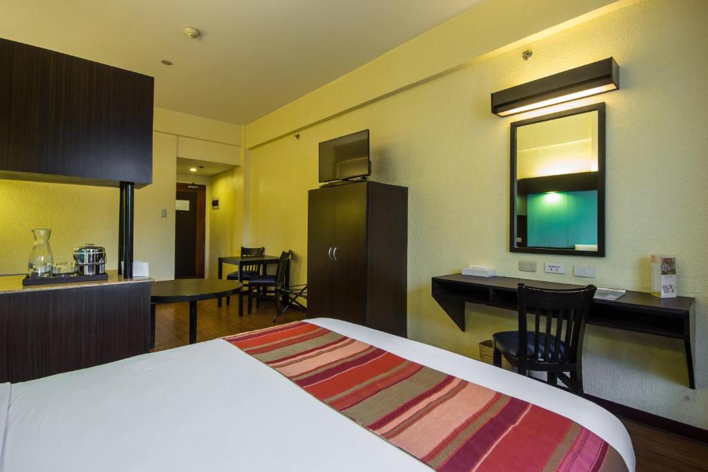 Kuchyň nebo kuchyňský kout v ubytování Microtel by Wyndham Batangas