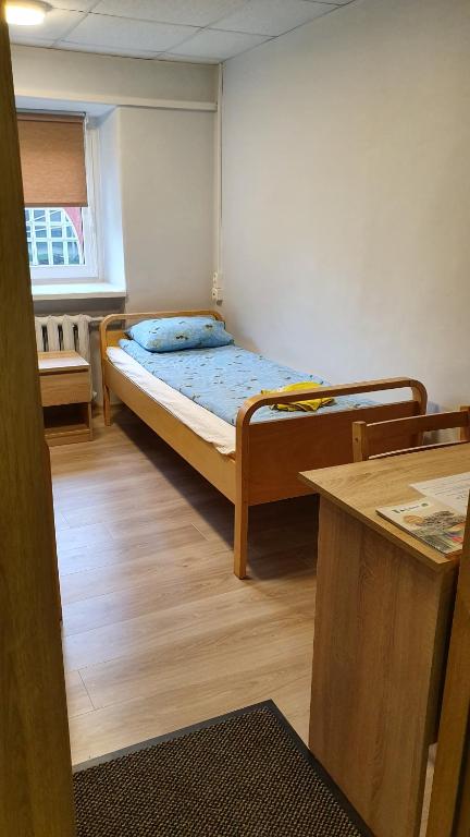 Postel nebo postele na pokoji v ubytování Cinema Hostel Järvakandi