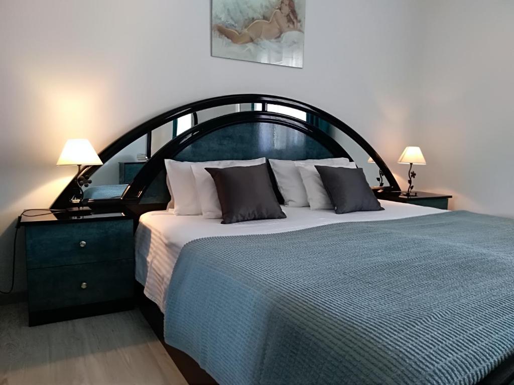 Postel nebo postele na pokoji v ubytování Apartments & Rooms Vitt