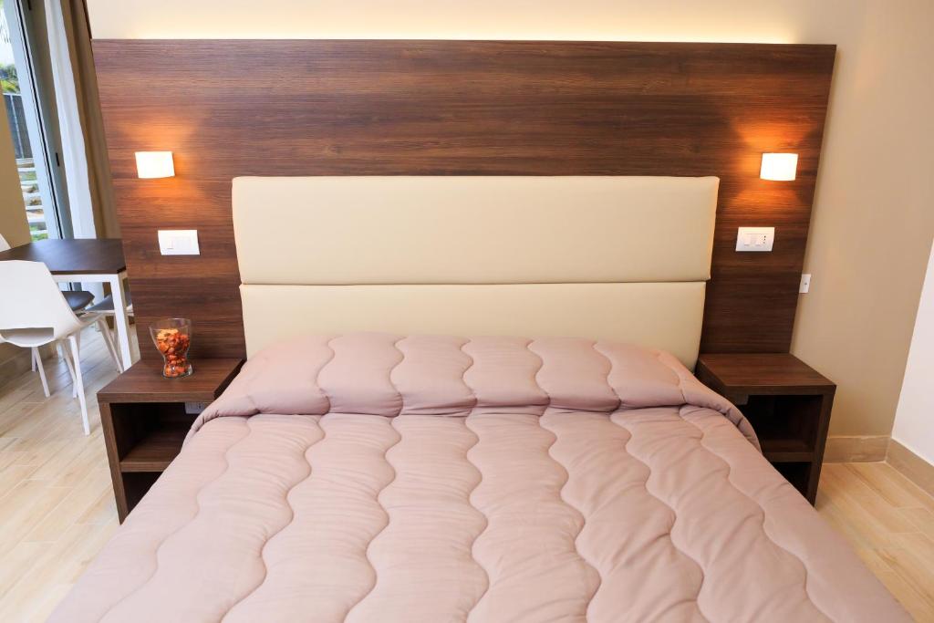 Postel nebo postele na pokoji v ubytování Vignadonica Resort