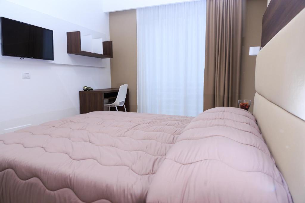 Postel nebo postele na pokoji v ubytování Vignadonica Resort