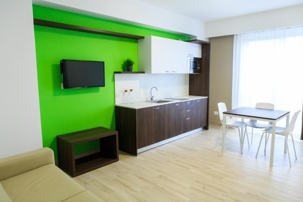 Kuchyň nebo kuchyňský kout v ubytování Vignadonica Resort
