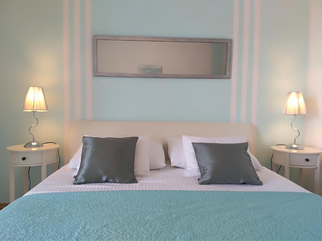 Postel nebo postele na pokoji v ubytování Apartments & Rooms Vitt