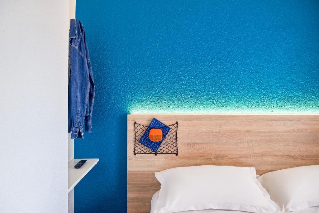 Postel nebo postele na pokoji v ubytování hotelF1 Montpellier Sud