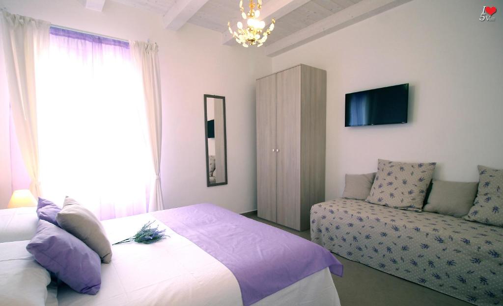 A bed or beds in a room at Agriturismo La dimora dei Re