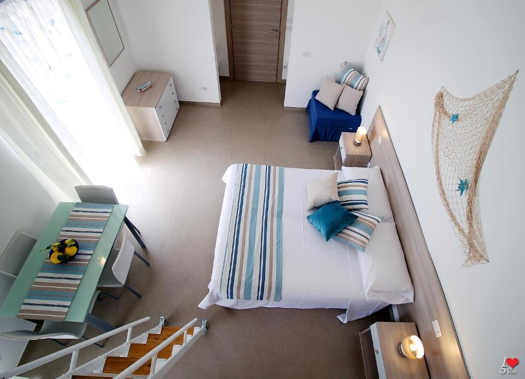 A bed or beds in a room at Agriturismo La dimora dei Re