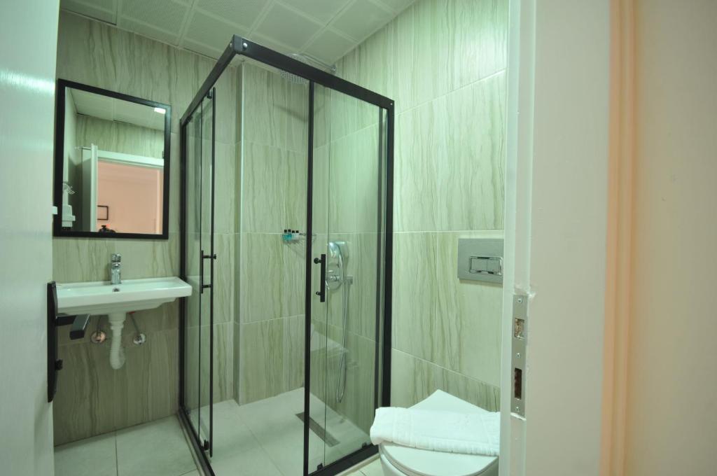 Koupelna v ubytování Club Sema Suite Hotel