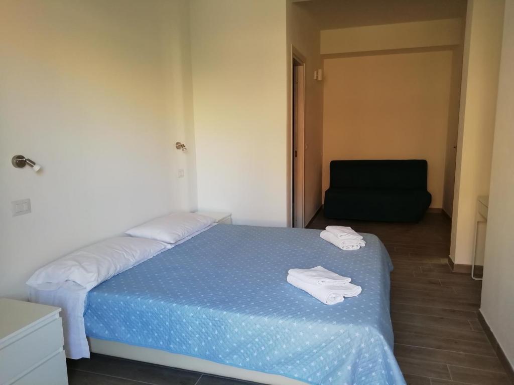 Posteľ alebo postele v izbe v ubytovaní DOMO ALGHERO CENTRO