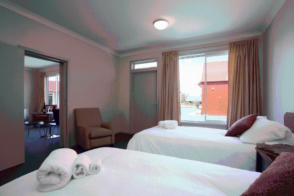 Postel nebo postele na pokoji v ubytování Hawkdun Lodge Motel