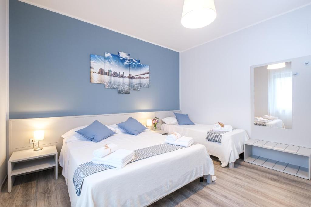 Posteľ alebo postele v izbe v ubytovaní HOME52