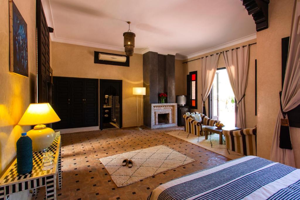 Postel nebo postele na pokoji v ubytování Riad Jawad & Spa
