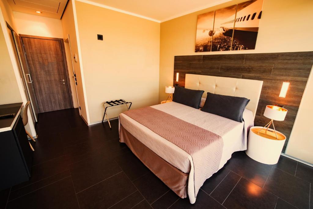 Postel nebo postele na pokoji v ubytování Star Hotel Airport Verona