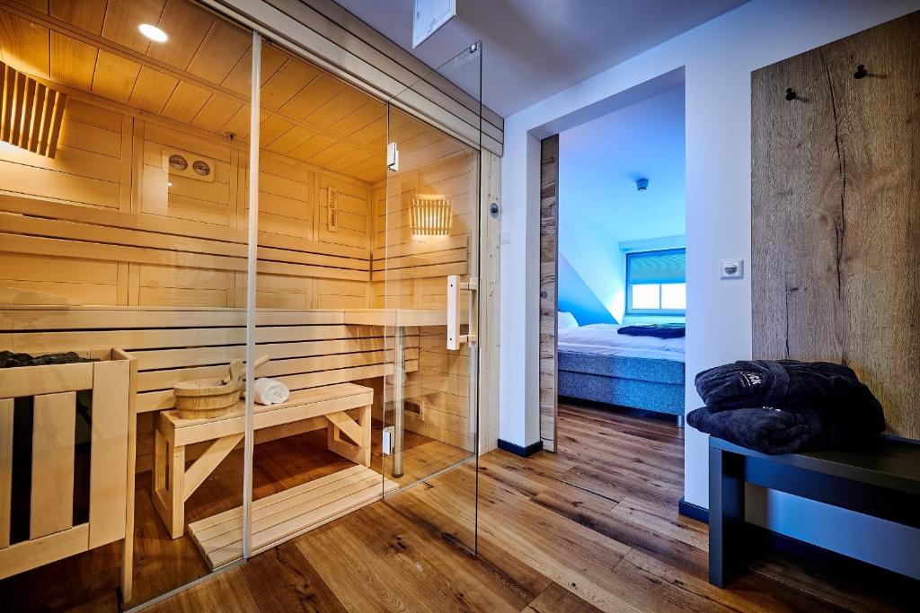 Postel nebo postele na pokoji v ubytování Hotel & Restaurant Herzstück Waldkirchen