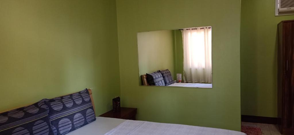 Postel nebo postele na pokoji v ubytování Stella'z guesthouse