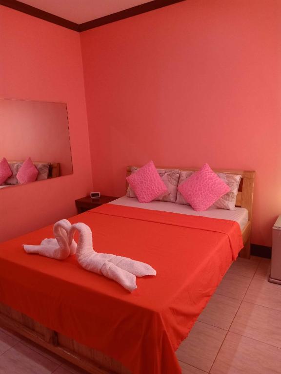 Postel nebo postele na pokoji v ubytování Stella'z guesthouse