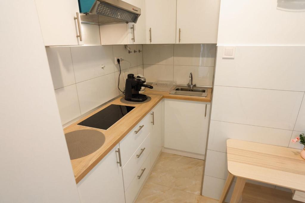 Kuchyňa alebo kuchynka v ubytovaní Town Hall Apartment