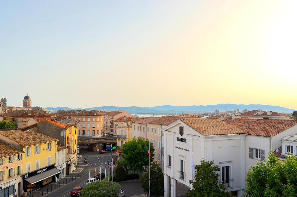 an aerial view of a city with buildings at 2 Pièces Liberté Plein Centre in Saint-Raphaël