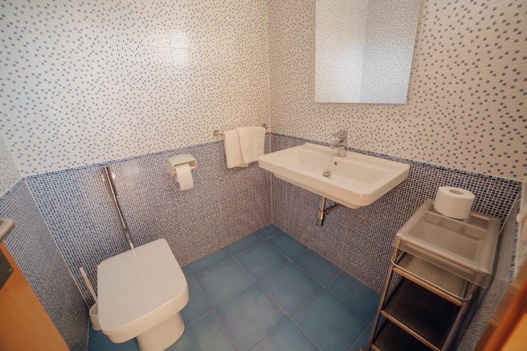 Koupelna v ubytování Apartamentos Palm Court