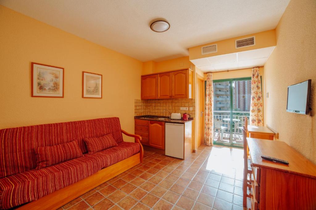 Kuchyň nebo kuchyňský kout v ubytování Apartamentos Palm Court