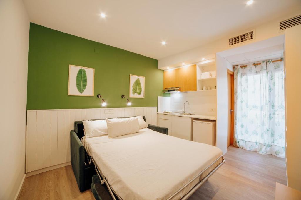 Kuchyň nebo kuchyňský kout v ubytování Apartamentos Palm Court