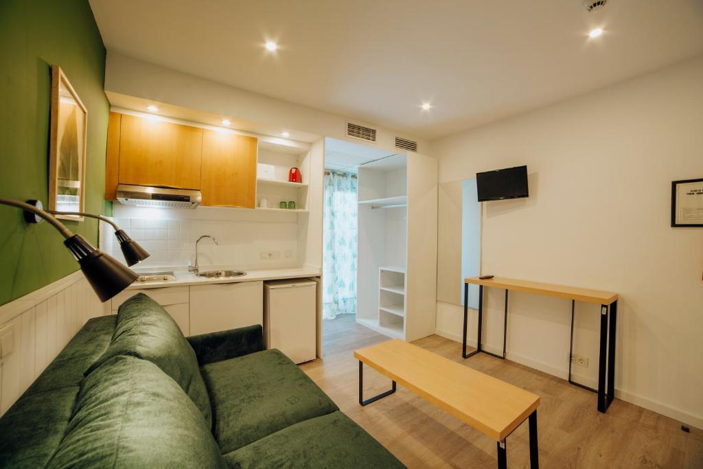 Kuchyň nebo kuchyňský kout v ubytování Apartamentos Palm Court