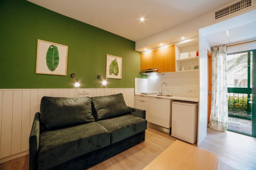 Kuchyň nebo kuchyňský kout v ubytování Apartamentos Palm Court