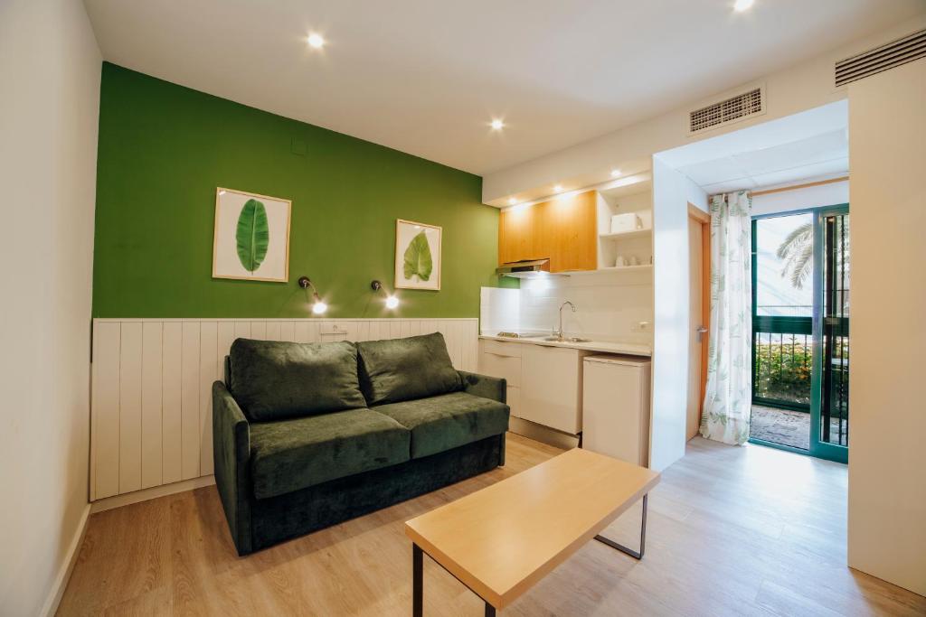 Kuchyň nebo kuchyňský kout v ubytování Apartamentos Palm Court