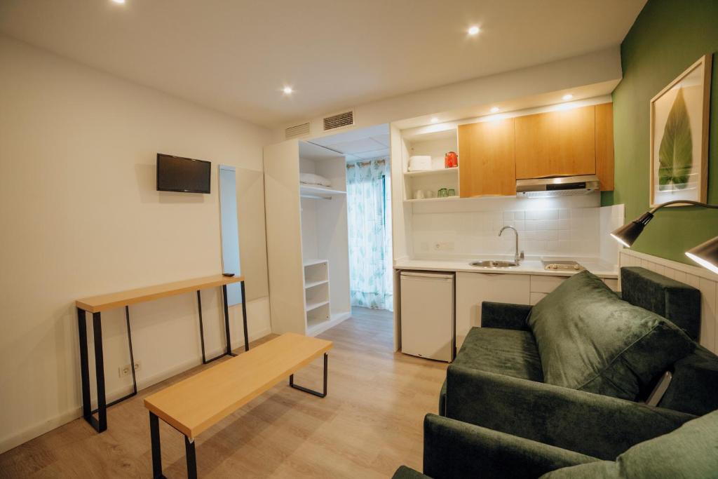 Kuchyň nebo kuchyňský kout v ubytování Apartamentos Palm Court