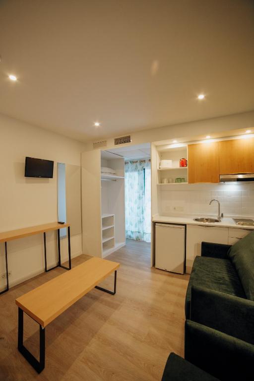 Kuchyň nebo kuchyňský kout v ubytování Apartamentos Palm Court