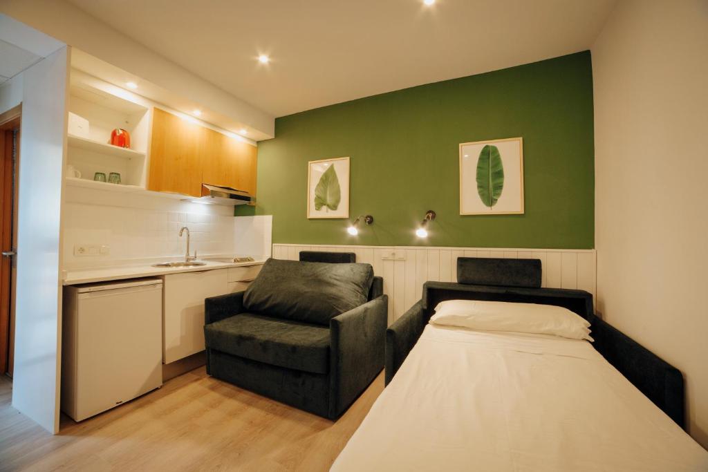 Kuchyň nebo kuchyňský kout v ubytování Apartamentos Palm Court